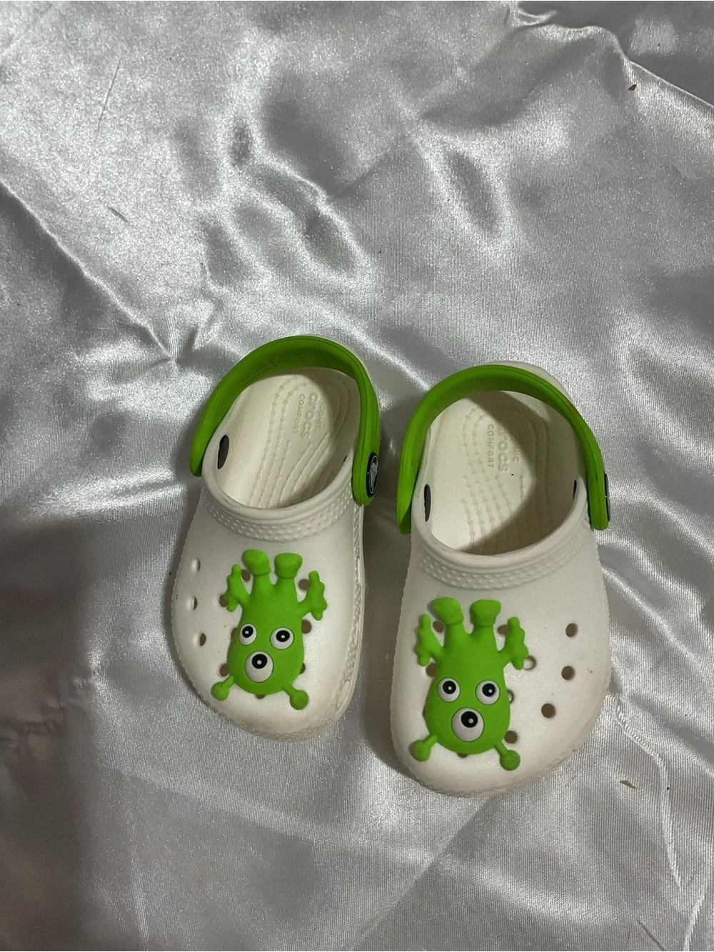 Kids White and Green Slip-On Clogs with Monster Charm glow in the dark